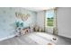 Bright flexible living space with yoga mats, shelving, and stylish decor at 8728 Wardle Ct, Wake Forest, NC 27587