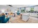 Open concept living space blending living, dining and kitchen areas with plenty of natural light at 8728 Wardle Ct, Wake Forest, NC 27587