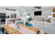 Stylish living space with white sofa, decor, and an open-concept layout at 8728 Wardle Ct, Wake Forest, NC 27587