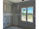 Bedroom with a window overlooking the front yard at 91 Retreat Run, Smithfield, NC 27577