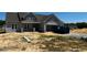 Charming single-story home with a two car garage featuring a well-manicured lawn and inviting curb appeal at 91 Retreat Run, Smithfield, NC 27577