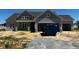Charming single Gathering home, light gray, showing construction progress at 91 Retreat Run, Smithfield, NC 27577
