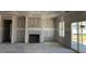 Spacious living room, under construction, with a fireplace at 91 Retreat Run, Smithfield, NC 27577