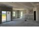 Spacious living room, under construction, with sliding door to backyard at 91 Retreat Run, Smithfield, NC 27577
