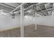Finished basement offers vinyl flooring and painted white walls at 1012 Rainey St, Burlington, NC 27217