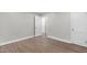 Bedroom featuring a gray walls, and refinished wood floors at 1012 Rainey St, Burlington, NC 27217