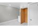 Bright kitchen with built-in cabinets and a door to an additional room at 1012 Rainey St, Burlington, NC 27217