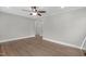 Empty living room featuring hardwood floors, a ceiling fan, and recessed lighting at 1012 Rainey St, Burlington, NC 27217
