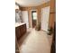 Spacious bathroom with a vanity and neutral tile flooring, offering comfort and functionality at 102 Kipling Dr, Oxford, NC 27565
