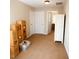 Spacious bedroom area, offering storage, multiple doors, and neutral carpeting at 102 Kipling Dr, Oxford, NC 27565