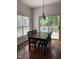 Bright dining area with sliding glass doors leading to an outdoor deck with lawn views at 102 Kipling Dr, Oxford, NC 27565