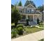 Charming two-story home with a welcoming front porch and well-maintained landscaping at 102 Kipling Dr, Oxford, NC 27565