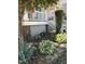 Charming front yard featuring well-maintained landscaping, flowering plants, and a classic bird bath at 102 Kipling Dr, Oxford, NC 27565