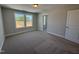 Large bedroom with a double window bringing in natural light and neutral walls at 1033 Bostonian Dr, Knightdale, NC 27545