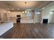 Bright kitchen featuring white cabinets, granite countertops, stainless steel appliances, and an island at 1033 Bostonian Dr, Knightdale, NC 27545