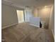 Interior view of the open, carpeted loft space at 1033 Bostonian Dr, Knightdale, NC 27545