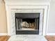 Classic fireplace featuring a marble surround and hearth at 106 Grange Dr, Wendell, NC 27591