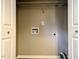 Dedicated laundry area with washer and dryer connections, offering convenience and functionality at 106 Grange Dr, Wendell, NC 27591