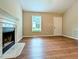 Spacious living room with fireplace and lots of natural light at 106 Grange Dr, Wendell, NC 27591