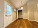 Inviting mud room entrance featuring wood flooring and a convenient closet for storage at 106 Grange Dr, Wendell, NC 27591