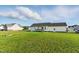 Vast backyard featuring a well-maintained lawn, a single-Gathering home, and a shed in the distance at 108 Hudson Dr, Princeton, NC 27569
