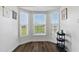 Bright breakfast nook with large bay windows offering serene views and natural light at 108 Hudson Dr, Princeton, NC 27569