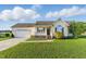 Charming single-story home with a well-manicured lawn, attached garage, and inviting front porch at 108 Hudson Dr, Princeton, NC 27569