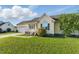 A well-maintained single-story home with green lawn and attached garage in a peaceful neighborhood at 108 Hudson Dr, Princeton, NC 27569