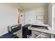 Bright office space with modern desk setup, plenty of storage, and easy access to closets at 108 Hudson Dr, Princeton, NC 27569