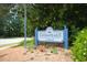 Welcoming Chesapeake Pointe sign amidst lush landscaping and serene neighborhood entrance at 111 Killam Ct # 2A, Cary, NC 27513
