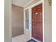 Close-up of the unit's front door with a pleasing color, offering privacy and security at 111 Killam Ct # 2A, Cary, NC 27513