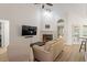 Bright living room featuring vaulted ceiling, fireplace, and hardwood floors for a cozy feel at 111 Killam Ct # 2A, Cary, NC 27513