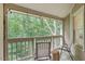 Relaxing porch featuring chairs with scenic view of trees and the outdoors at 111 Killam Ct # 2A, Cary, NC 27513