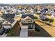 Aerial view showcasing the two-story home in a well-planned neighborhood with manicured lawns at 1236 Shadow Shade, Wake Forest, NC 27587