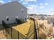 Spacious fenced backyard showcasing a lush lawn and view of the neighborhood at 1236 Shadow Shade, Wake Forest, NC 27587