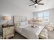 Inviting bedroom with natural light, ceiling fan, and crib near the queen-size bed at 1236 Shadow Shade, Wake Forest, NC 27587