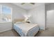 Relaxing bedroom with a tufted headboard, soft lighting, and inviting décor at 1236 Shadow Shade, Wake Forest, NC 27587