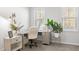 Bright home office featuring large windows, modern furnishings, and stylish decor at 1236 Shadow Shade, Wake Forest, NC 27587