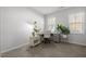 Home office setup featuring lots of plants, large windows, modern furnishings, and stylish decor at 1236 Shadow Shade, Wake Forest, NC 27587