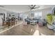 Open concept living space featuring a dining area, modern kitchen, and large sectional sofa at 1236 Shadow Shade, Wake Forest, NC 27587