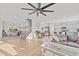Open concept living space featuring a staircase, dining area, modern kitchen, and large sectional sofa at 1236 Shadow Shade, Wake Forest, NC 27587