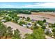 An aerial view of the property with surrounding farmland and landscape, located just 5.6 miles from Dunn at 128 Christy Ln, Dunn, NC 28334