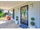Charming front porch featuring comfortable seating, stylish decor, and a welcoming entrance at 128 Christy Ln, Dunn, NC 28334