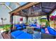 Cozy outdoor living space with comfortable seating, a fire pit, and stylish decor, perfect for entertaining at 128 Christy Ln, Dunn, NC 28334
