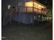 Exterior view of backyard deck with a stairway and backyard space at 1345 Ellis Rd, Durham, NC 27703