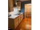 Modern kitchen featuring countertops, white subway tile backsplash, and stainless appliances at 1345 Ellis Rd, Durham, NC 27703