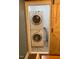 Convenient laundry area featuring a stacked washer and dryer, and a rustic barn door at 1345 Ellis Rd, Durham, NC 27703