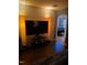 Cozy living room with dark hardwood floors and a view of the bedroom at 1345 Ellis Rd, Durham, NC 27703