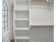 Bright walk-in closet with built-in shelving and ample hanging space at 150 Remington Ct, Youngsville, NC 27596