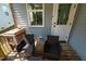 View of the back of the home featuring a screened-in porch and a staircase at 187 Ashley Woods Ct, Clayton, NC 27527